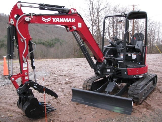 A Yanmar mini-excavator on the Swantak lot
