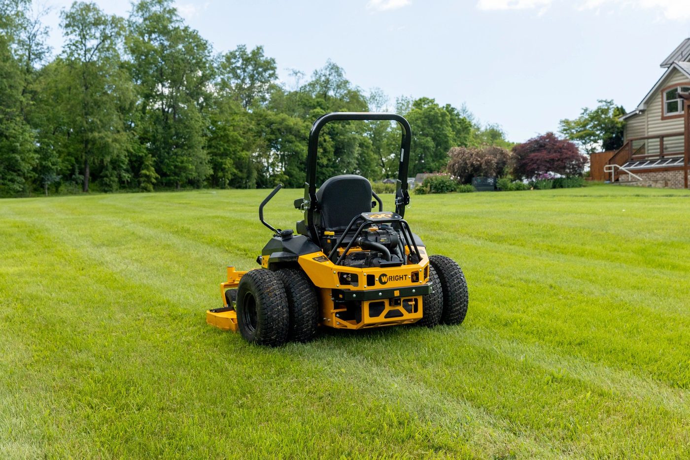 A Wright zero-turn mower on a freshly cut lawn